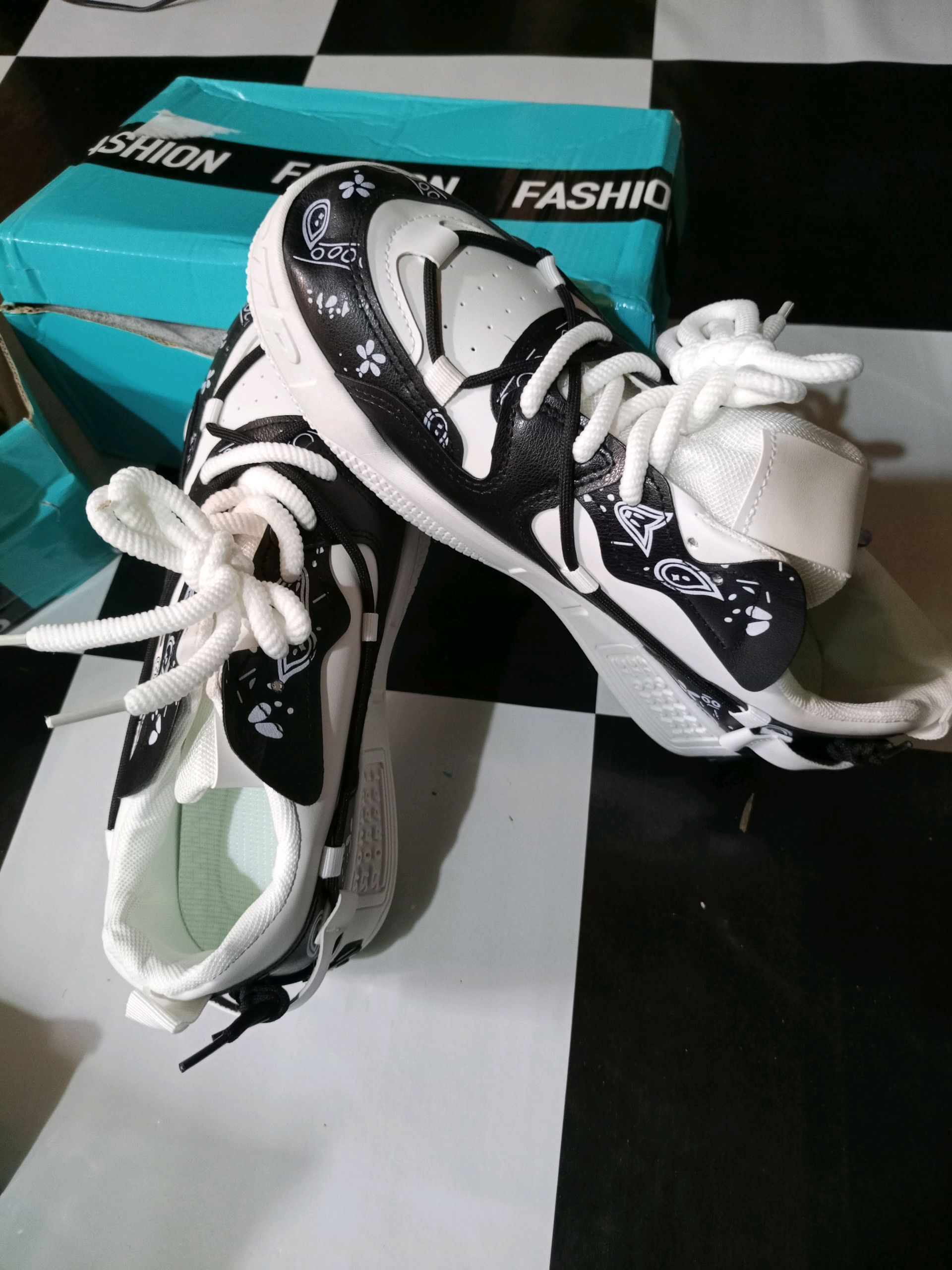 Stylish Black and White Sneakers